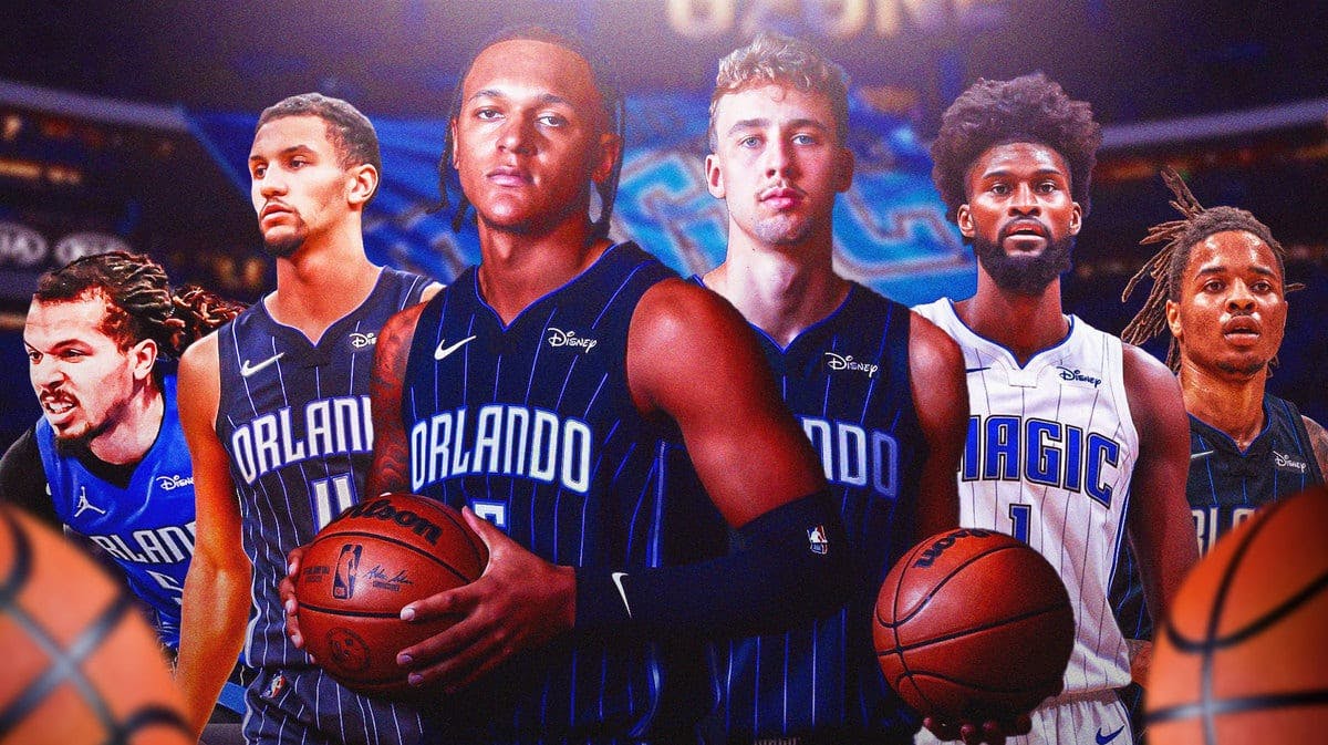 Paolo Banchero and Franz Wagner in front and center each holding a basketball, surrounded by Jonathan Isaac, Markelle Fultz, Jalen Suggs, and Cole Anthony in the Amway Center.