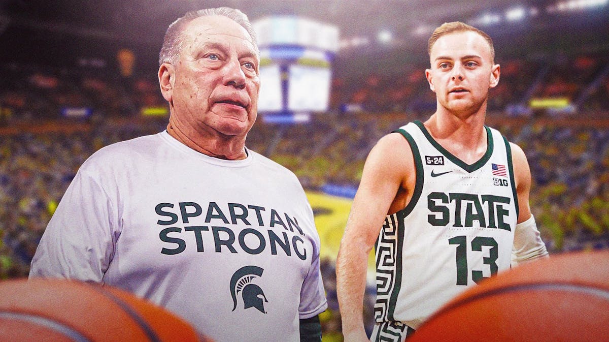 Tom Izzo smiling next to Steven Izzo in a Michigan State basketball jersey