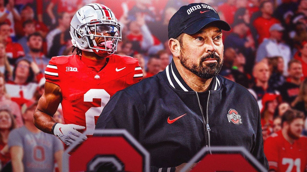 Photo: Ryan Day with Ohio State gear and Emeka Egbuka with Ohio State uniform with angry mob behind them (Ohio State fans)