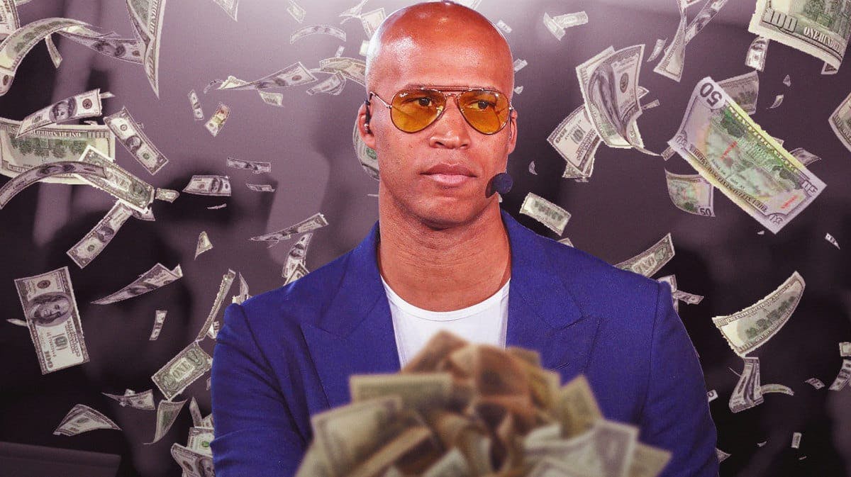 Richard Jefferson surrounded by piles of cash.