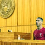 Cristiano Ronaldo sitting in a courthouse