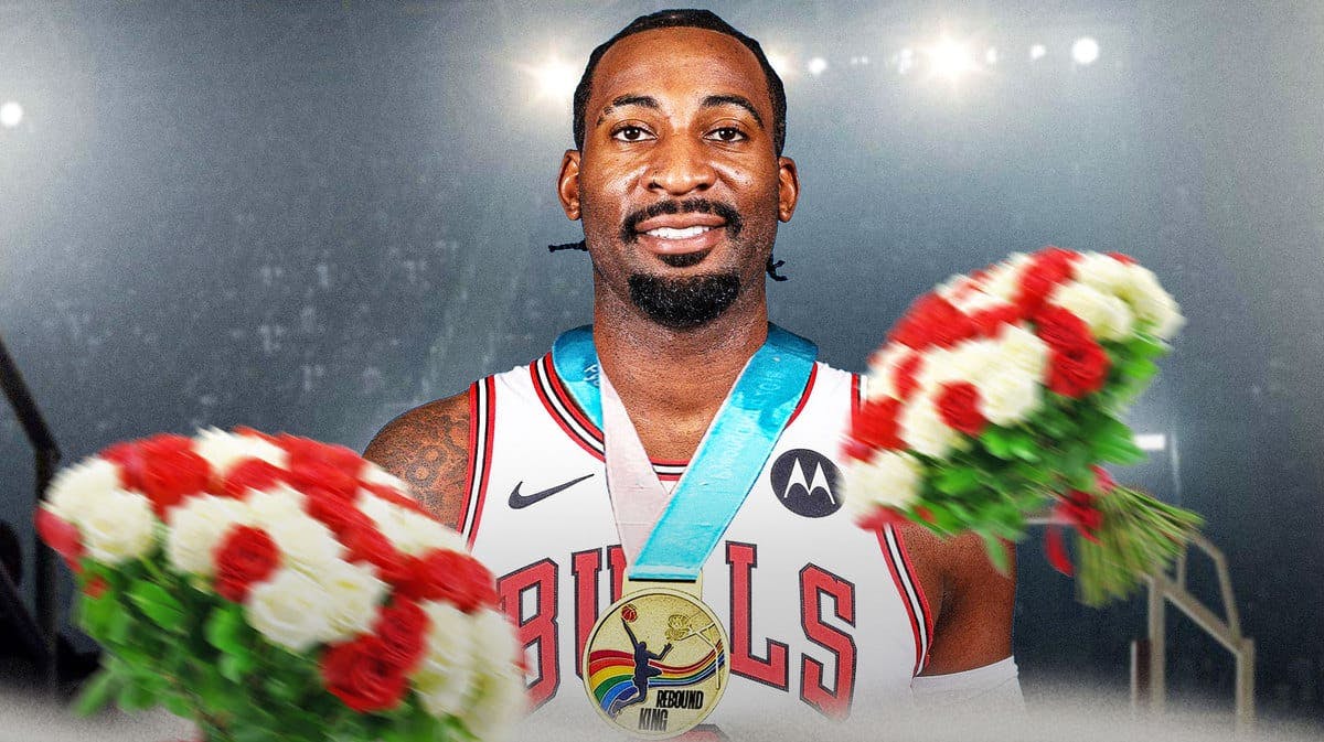 Bulls' Andre Drummond looking happy wearing a medal, with title on the medal: “REBOUNDING KING” with flowers being thrown at him