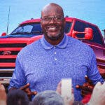 Shaquille "Big Diesel: O'Neal in front of his big diesel Ford truck.