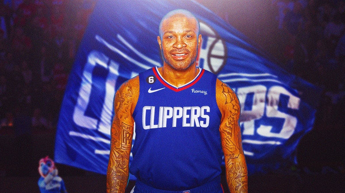 PJ Tucker in Clippers jersey with a Clippers flag behind him