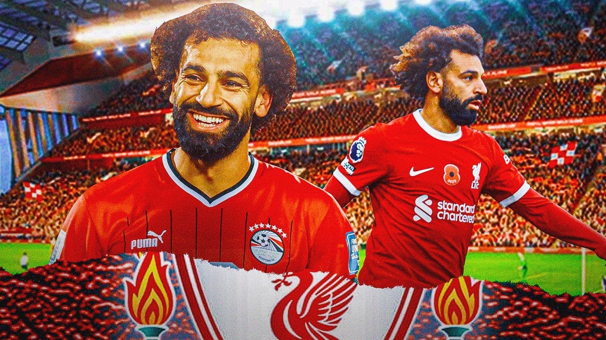 Mohamed Salah in front of the Liverpool logo