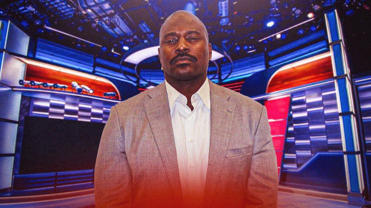 Marcellus Wiley looking serious in a suit