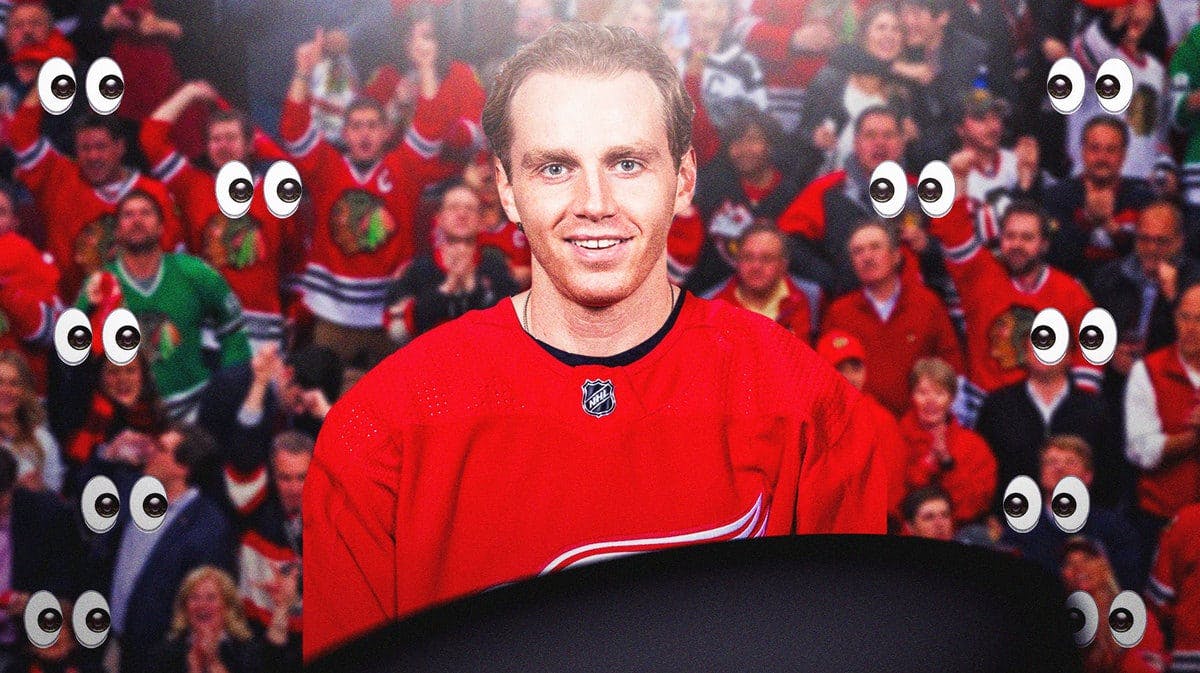 Patrick Kane in Red Wings uniform and in the middle of Blackhawks fans with woke eyes