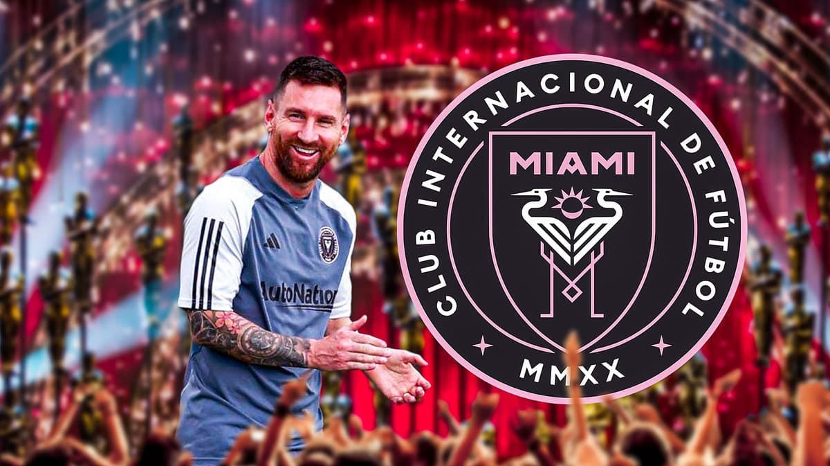 Lionel Messi clapping in an award ceremony in a seat, the Inter Miami logo in the air