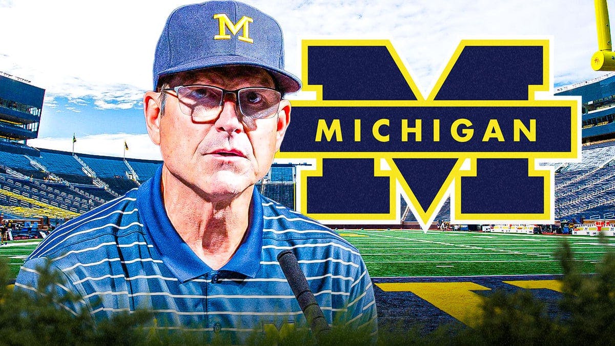 Jim Harbaugh with the Michigan logo in the background