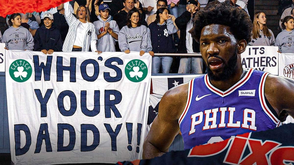 Sixers' Joel Embiid with a who's your daddy sign beside him