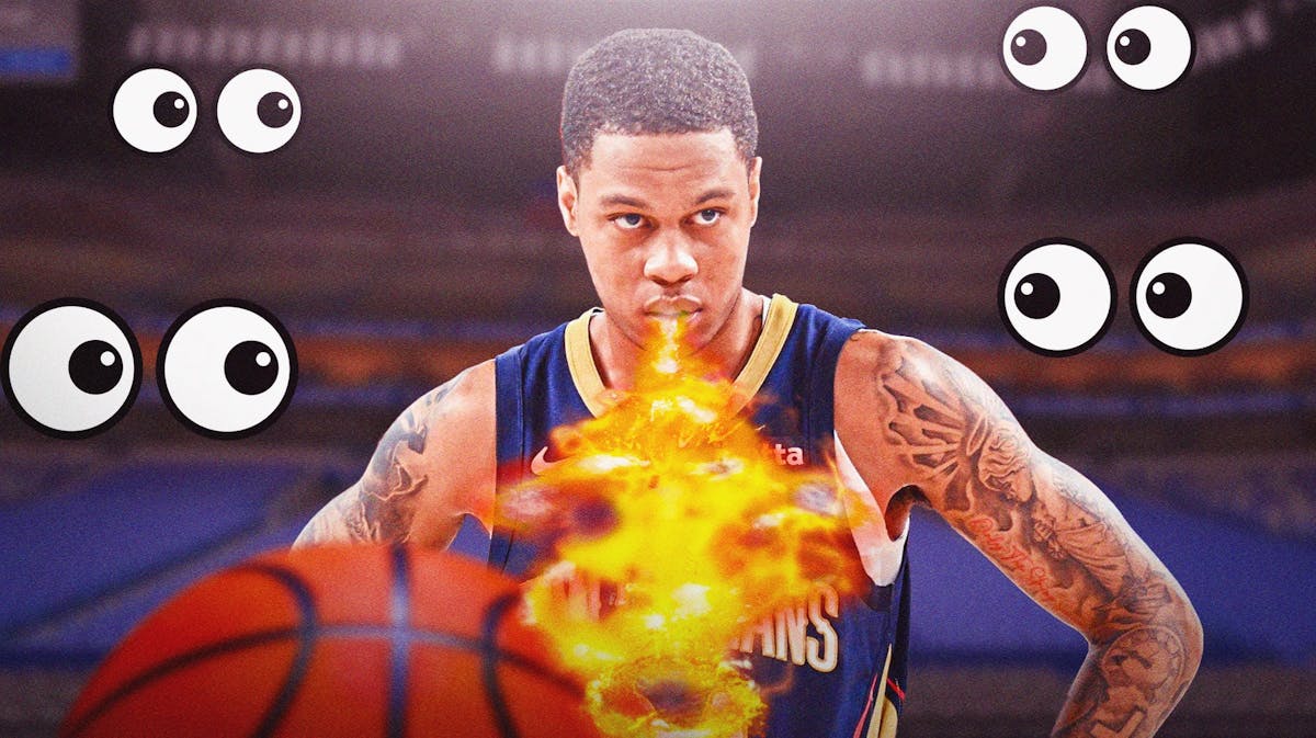 Jordan Hawkins breathing fire with eyeball emojis around him