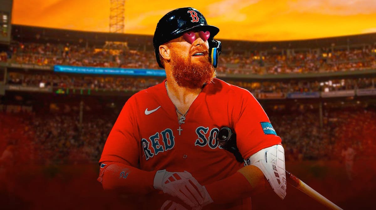 Justin Turner with heart eyes in Red Sox jersey, Fenway Park as the background
