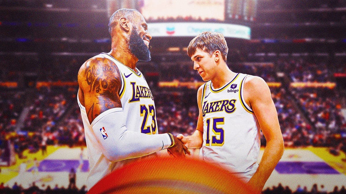 Los Angeles Lakers stars Austin Reaves and LeBron James in front of Crypto.com Arena.