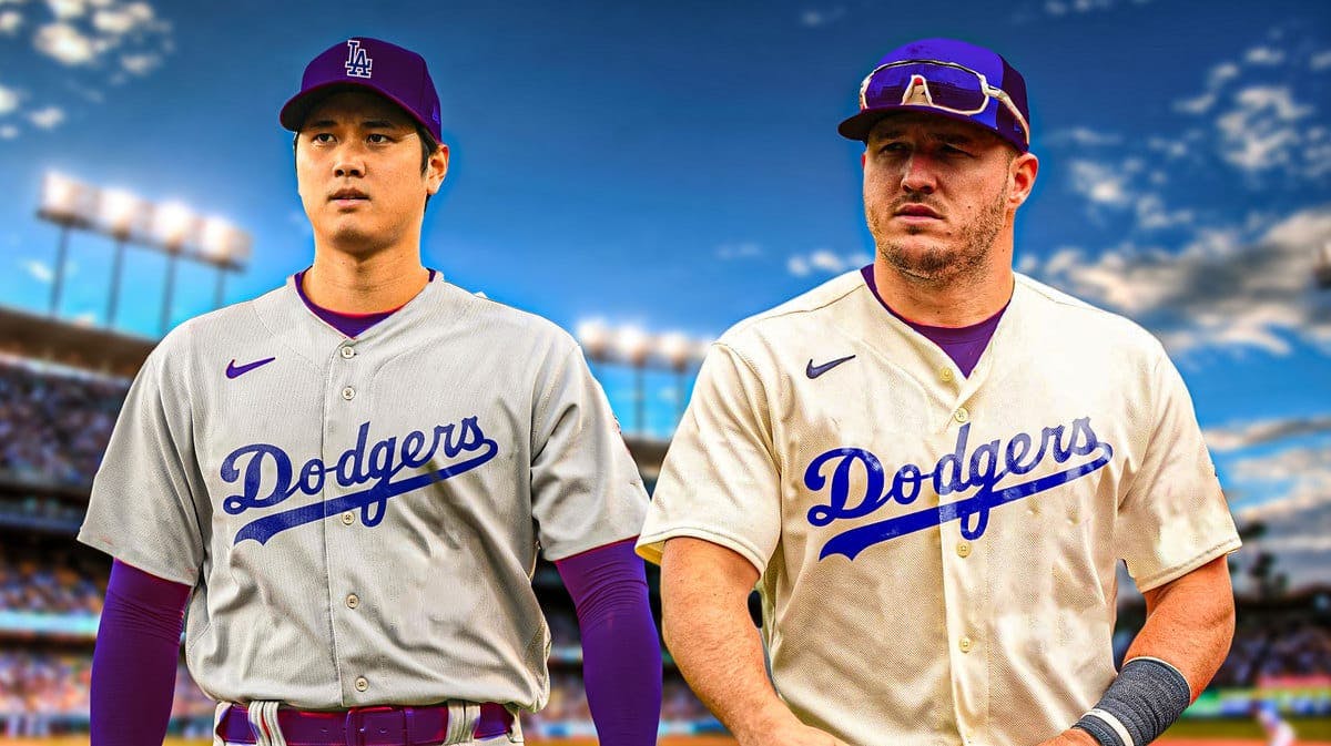 Shohei Ohtani and Mike Trout both in Dodgers uniforms at Dodger Stadium.