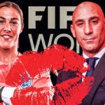 Mary Earps and Luis Rubiales in front of the Women’s World Cup logo with a kiss mark in front of them