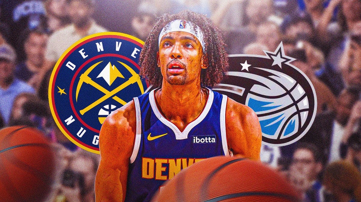 Zeke Nnaji with both the Nuggets and Magic logos in the background