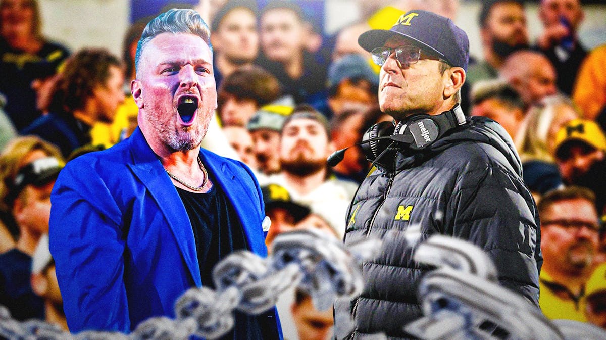 Pat McAfee on the left laughing with Michigan coach Jim Harbaugh on the right and fans in the background looking sad.