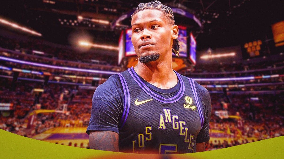 Cam Reddish with the Lakers arena in the background