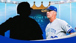 Silhouette of Garrett Hampson and Kansas City Royals manager Matt Quatraro