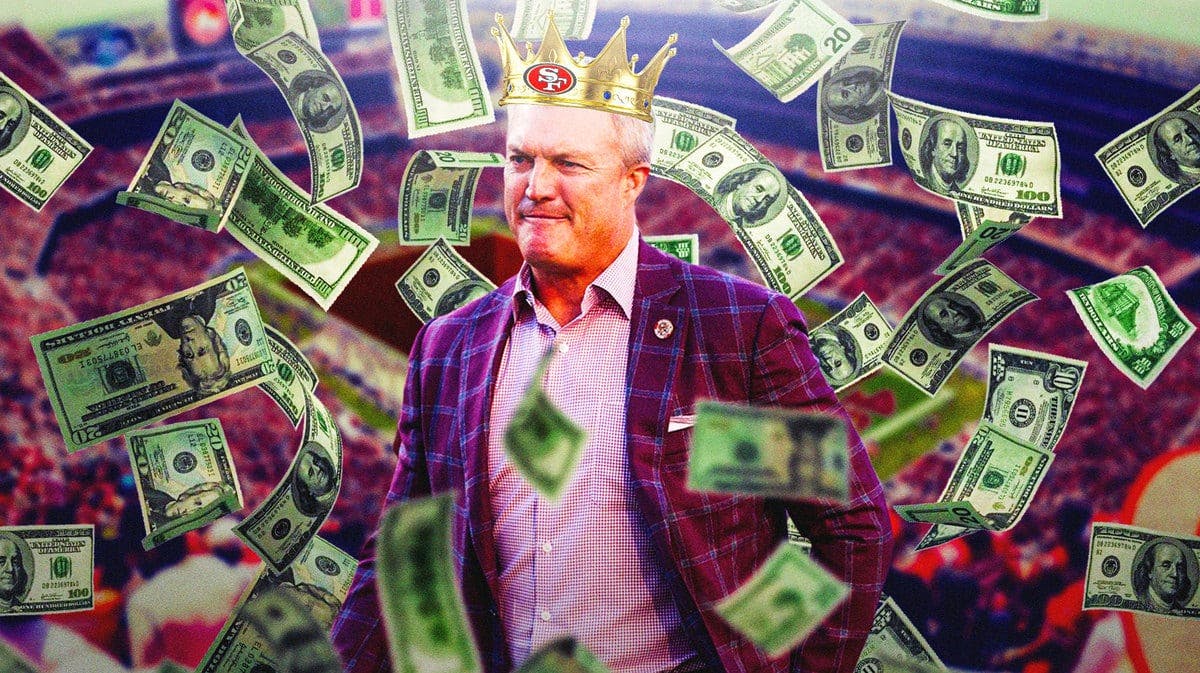 49ers GM John Lynch wearing a crown and surrounded by money