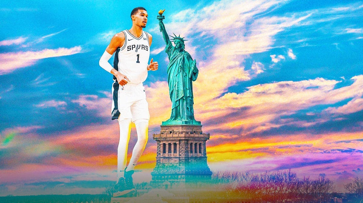 Victor Wembanyama of the Spurs towering over the Statue of Liberty.