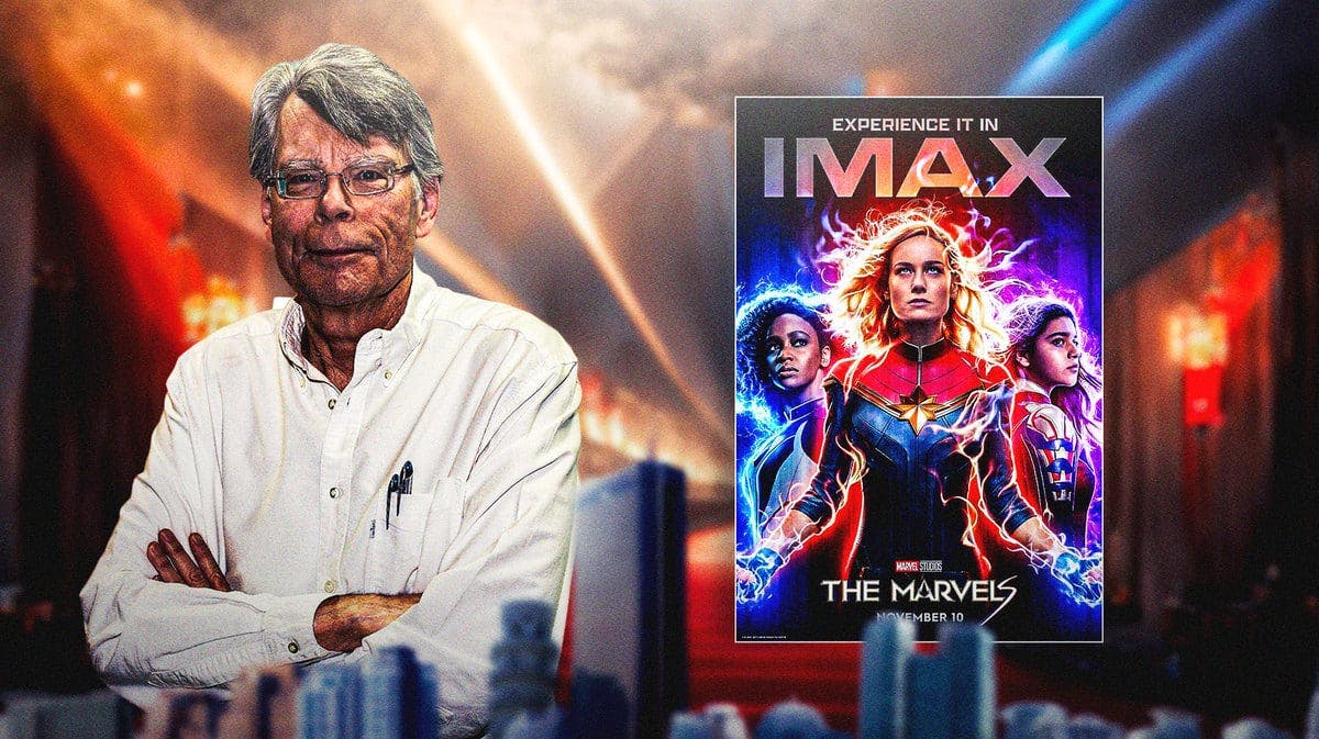 Stephen King next to The Marvels poster.