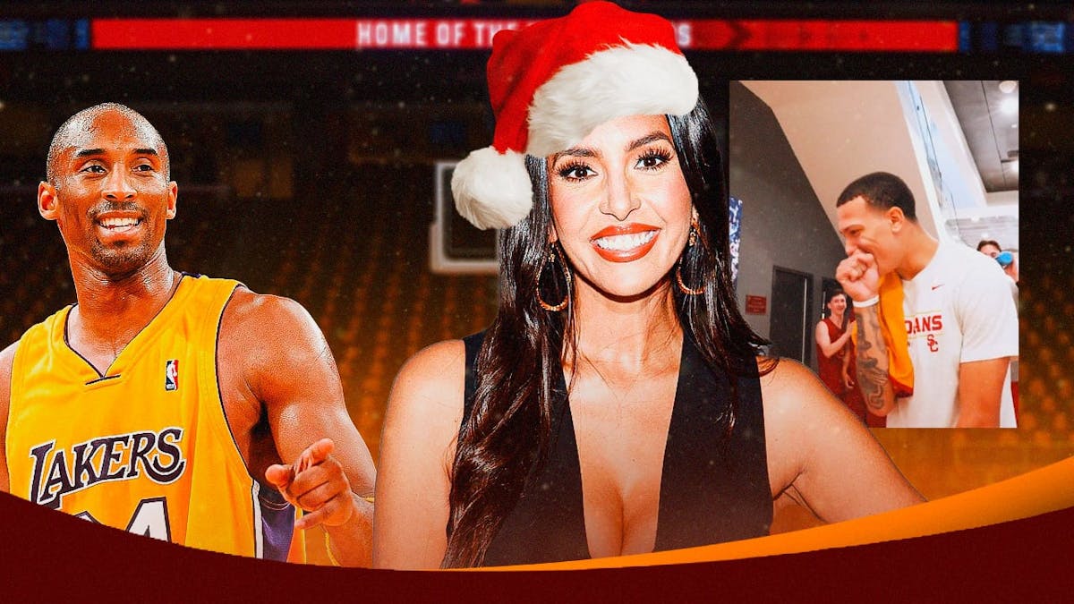 Vanessa Bryant with Santa's hat, Kobe Bryant of the Lakers in the background pointing, USC basketball screenshot
