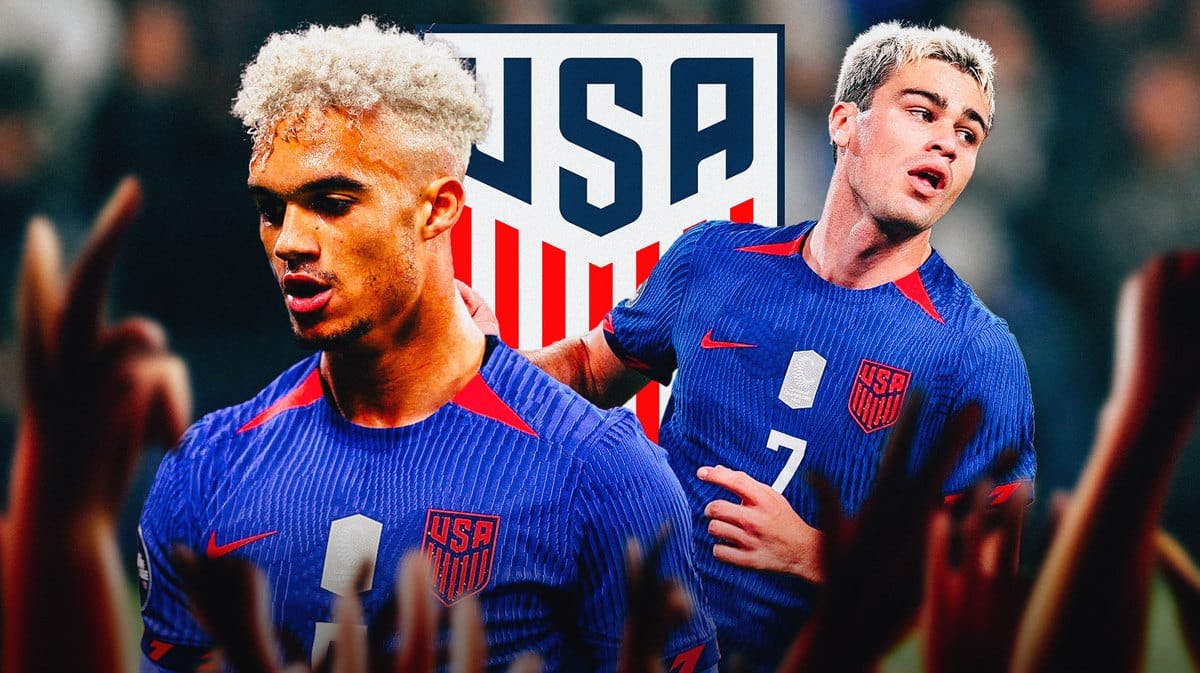 Gio Reyna and Anthonee Robinson in front of the USMNT logo