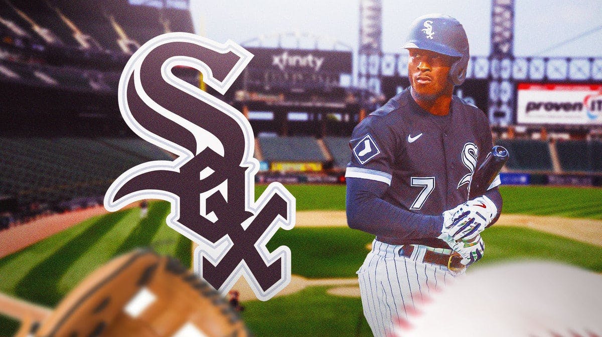 Tim Anderson walking away from the Chicago White Sox logo.