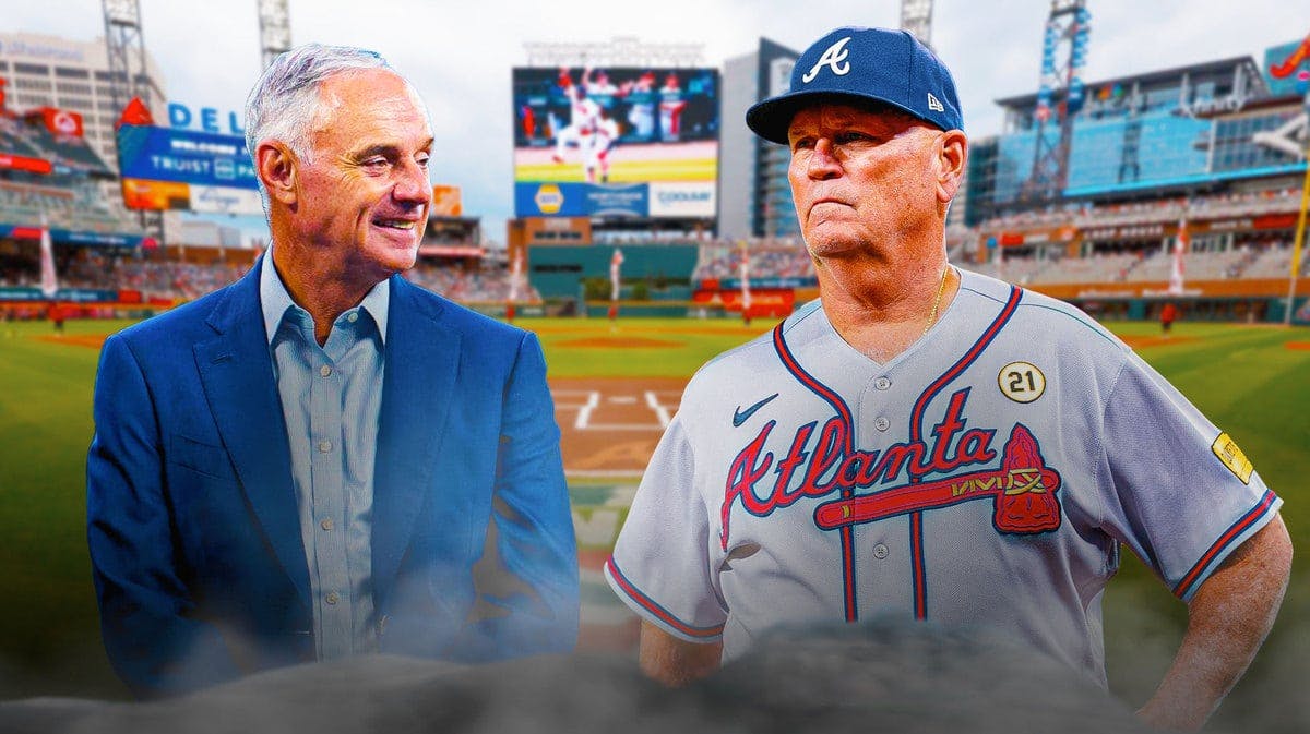 MLB commissioner Rob Manfred and Atlanta Braves manager Brian Snitker