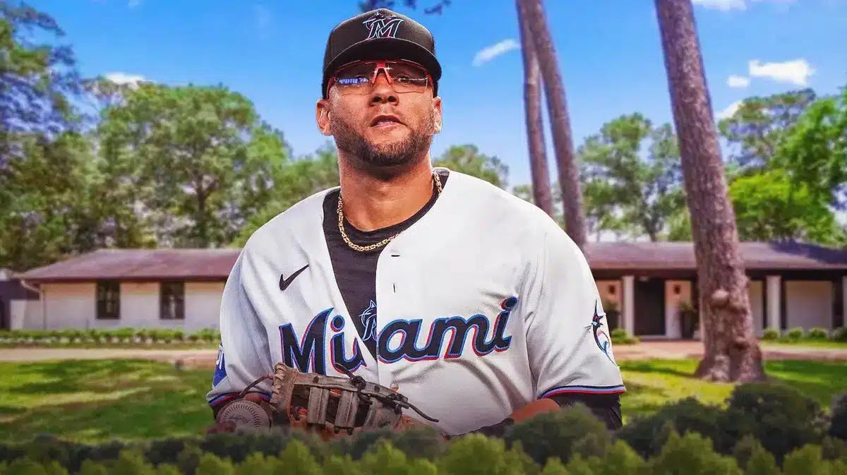 Yuli Gurriel in front of the home he's selling in Houston.
