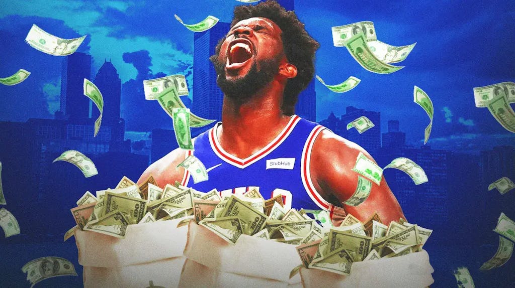 Joel Embiid surrounded by piles of cash.