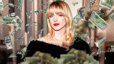 Mckenna Grace surrounded by piles of cash.