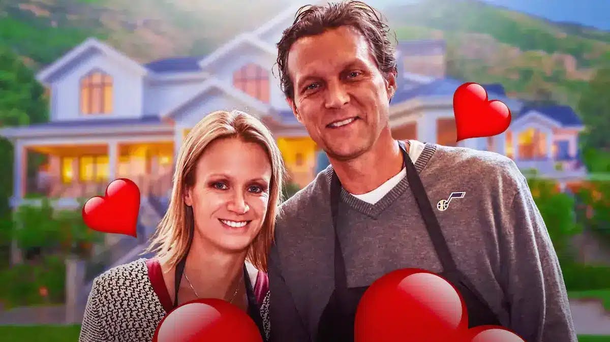 Quin Snyder and Amy Snyder surrounded by hearts.