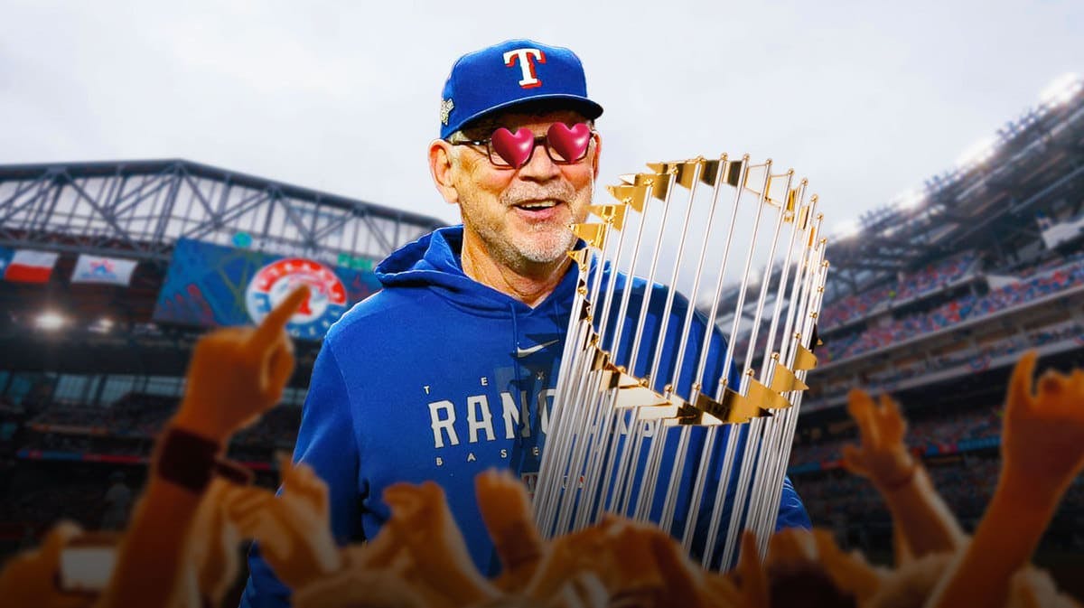 Texas Rangers manager Bruce Bochy with the World Series trophy