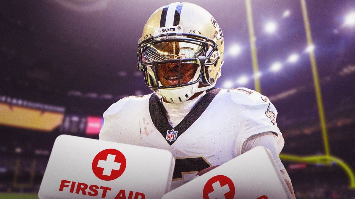 New Orleans Saints receiver Michael Thomas with first-aid kits in front of the Caesars Superdome.