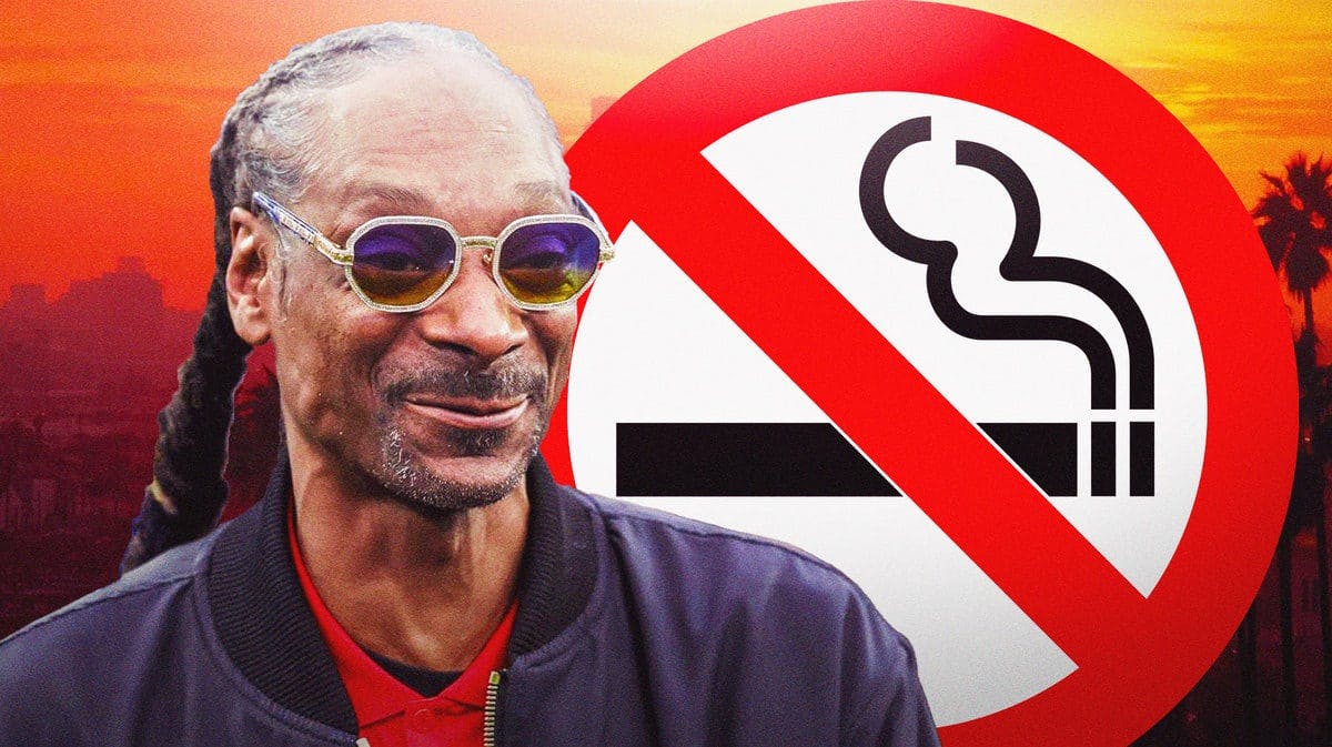 Snoop Dogg with a no smoking sign.