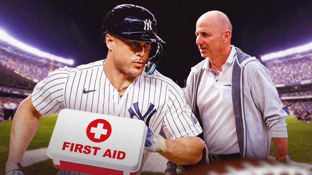 Giancarlo Stanton with a first aid kit, Brian Cashman