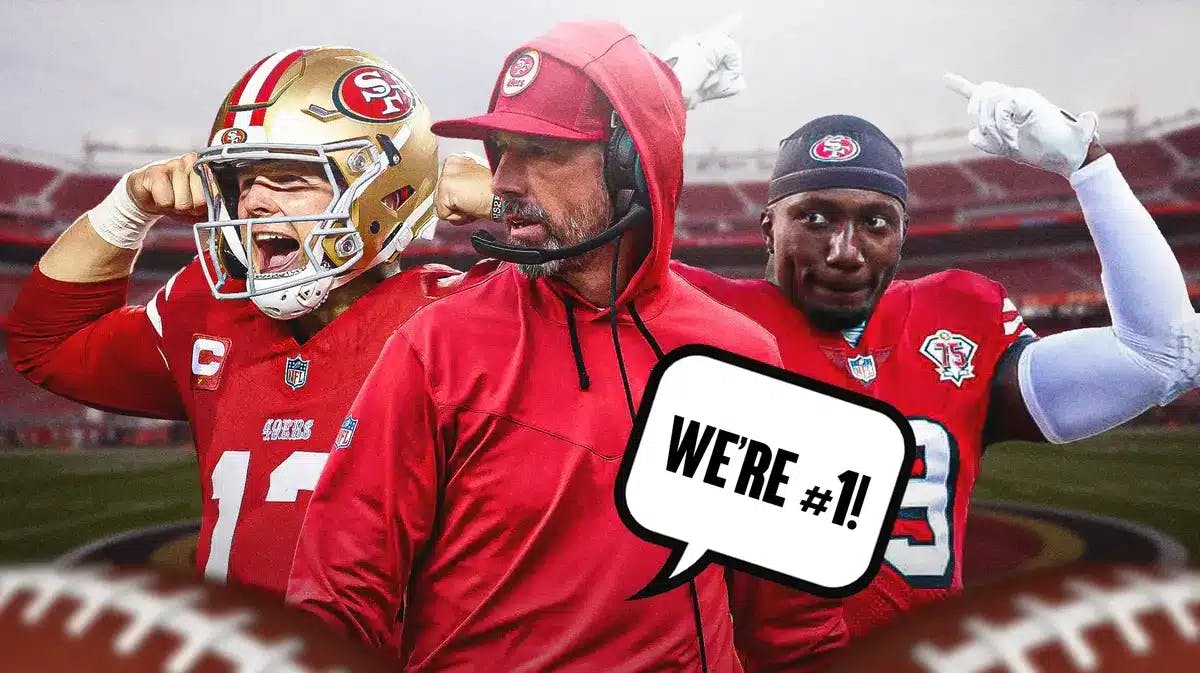 San Francisco 49ers coach Kyle Shanahan and speech bubble “We’re #1!” and Brock Purdy and Deebo Samuel next to him in background.