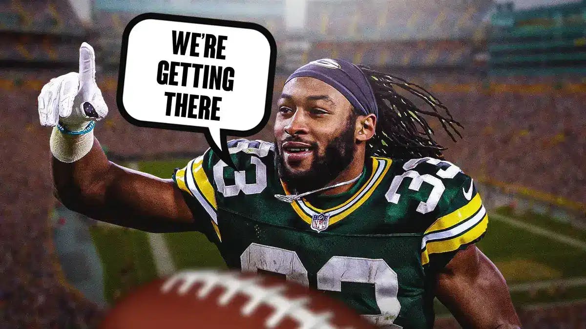 Photo: Aaron Jones in action in Packers jersey saying “We’re getting there”