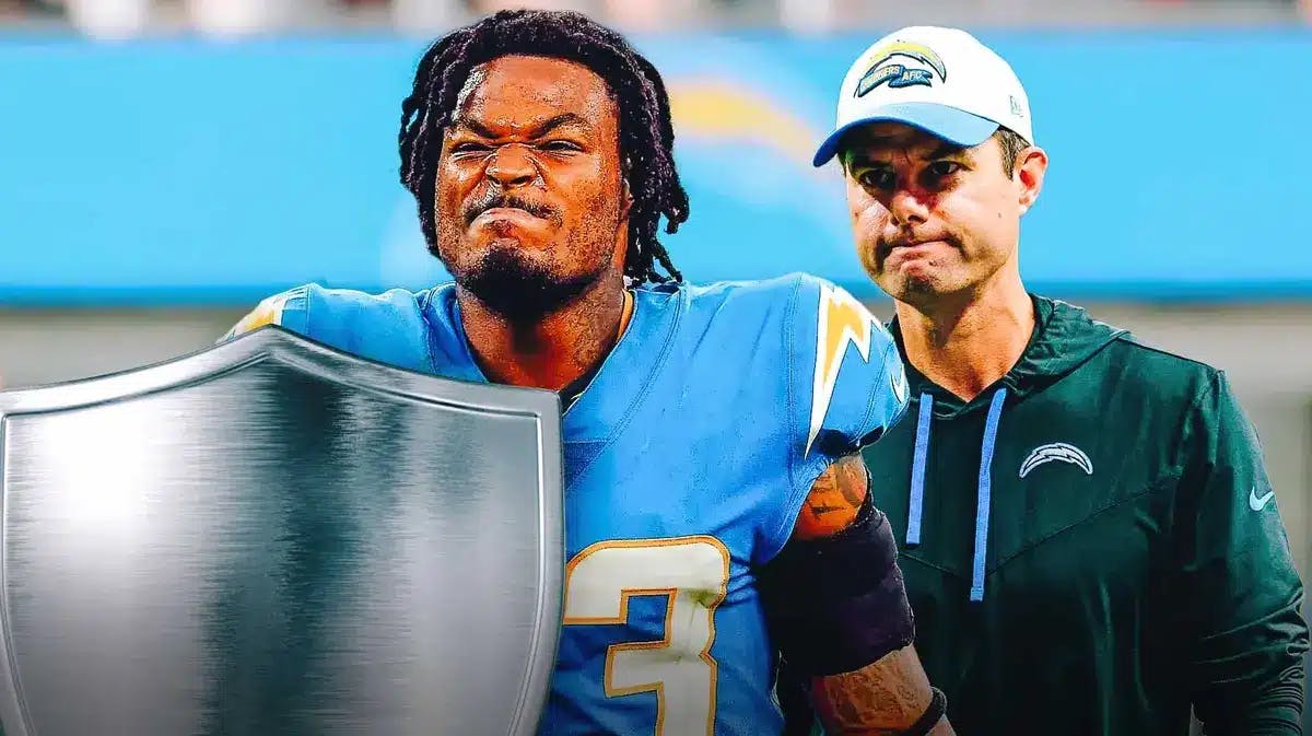 Thumb: Derwin James holding a shield. Chargers' Brandon Staley behind him.