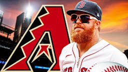 Boston Red Sox player Justin Turner in front of the Arizona Diamonbacks logo