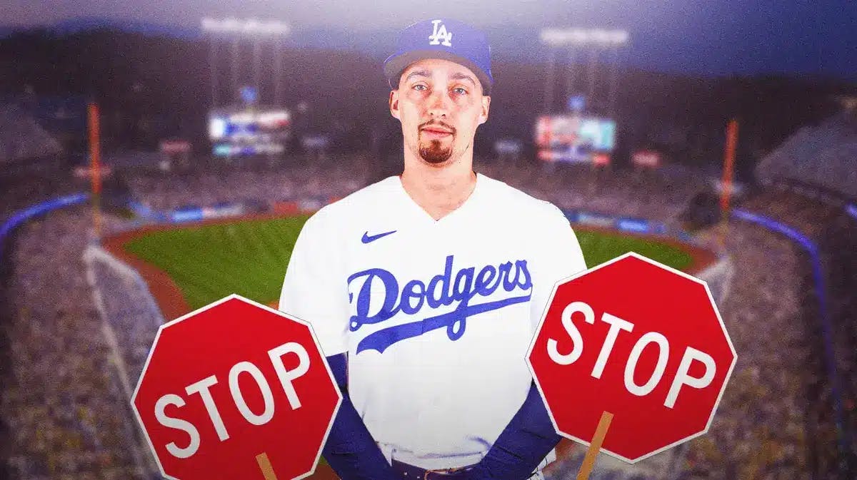 Blake Snell in a Dodgers jersey. Place a stop sign next to him.