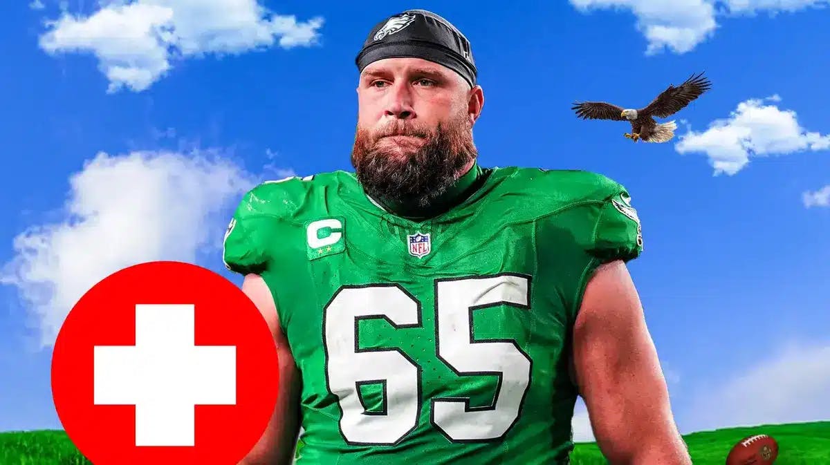 Eagles' Lane Johnson looking disappointed, with red medical cross around him