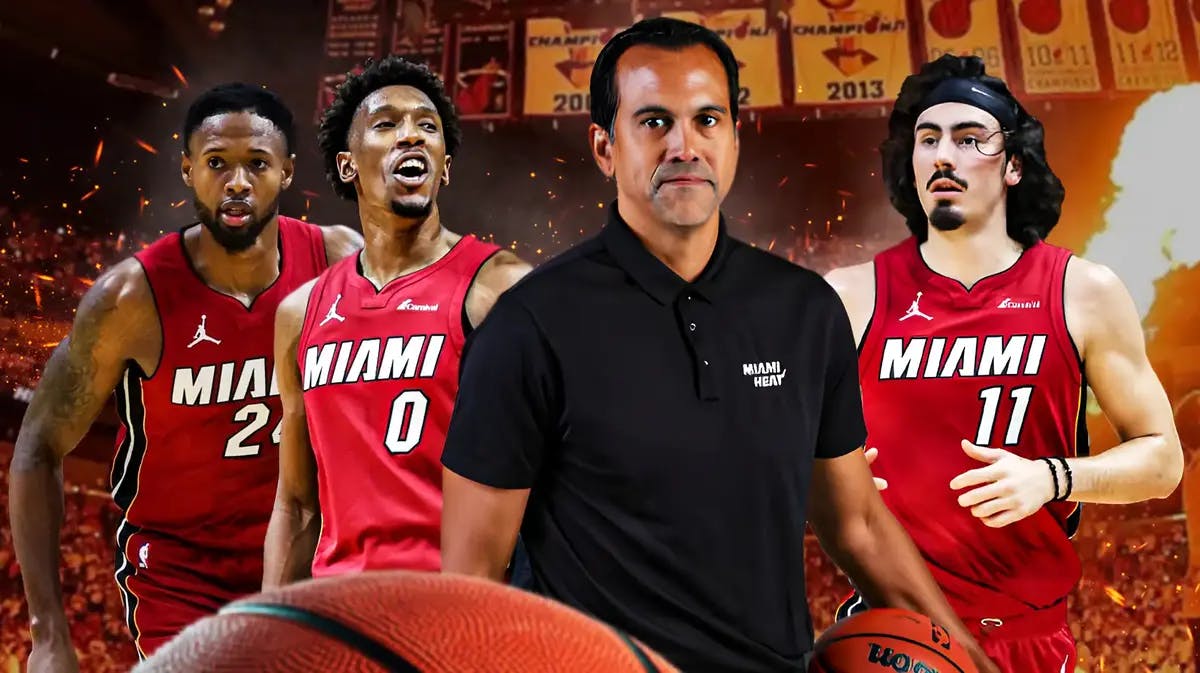 Miami Heat's Erik Spoelstra, Jaime Jaquez Jr., Josh Richardson, and Haywood Highsmith in front of the Kaseya Center.