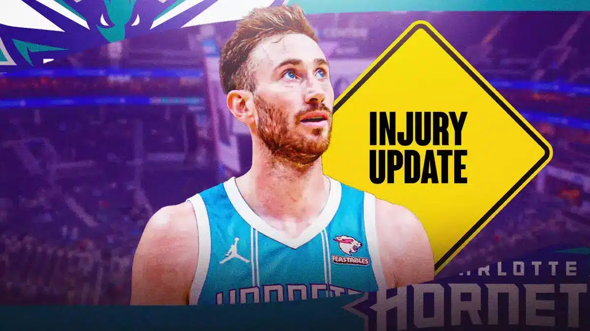 Charlotte Hornets forward Gordon Hayward in front of sign that says "Injury Update"