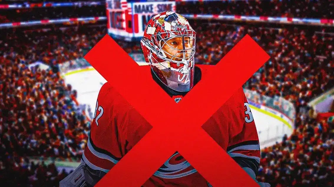 Photo: Antti Raanta in Hurricanes jersey with an X through him