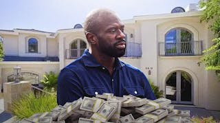 Former NBA player Jason Richardson in front of his former home in Oakland, Calif.