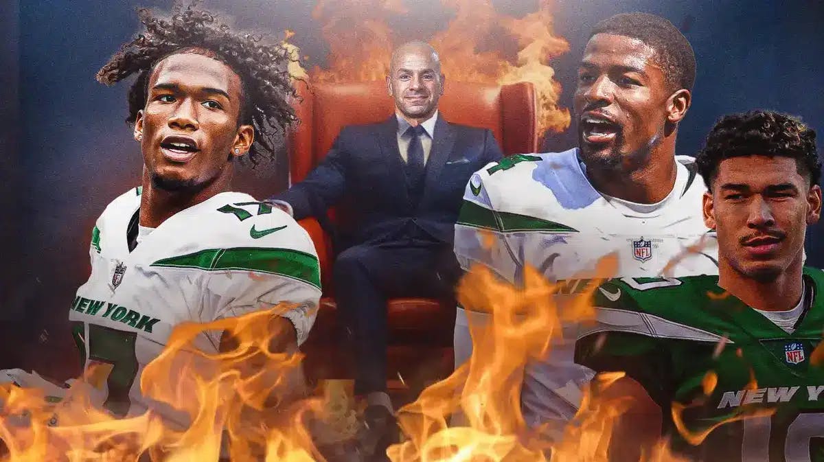 image thumb: Robert Saleh siting in chair with blazing fire underneath it. Looking on are DJ Reed, Allen Lazard and Garrett Wilson