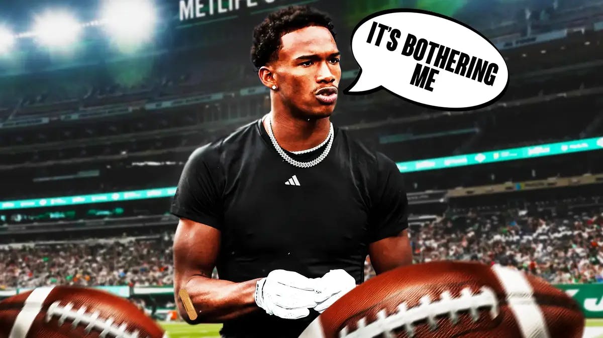 New York Jets' Garrett Wilson with band-aid on right elbow and speech bubble “It’s Bothering Me”